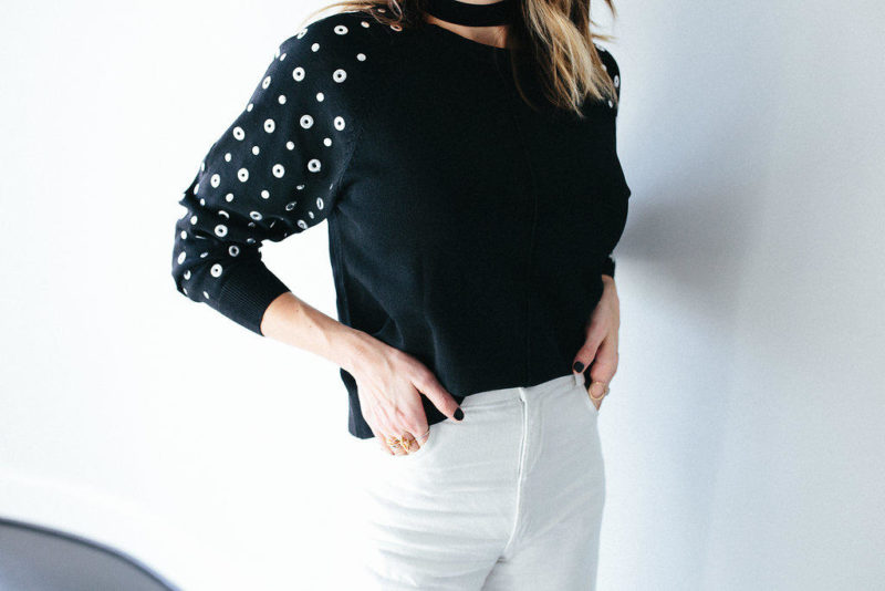Blogger Lindsey Lutz wearing studded Topshop top 